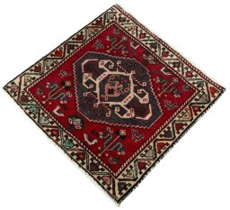 Corner detail of 2000s Shiraz rug showing border pattern and Wool pile