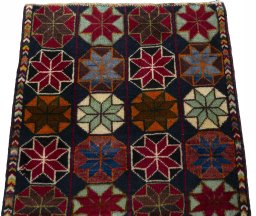 Surface texture of 2000s Shiraz rug with natural Wool and intricate pattern
