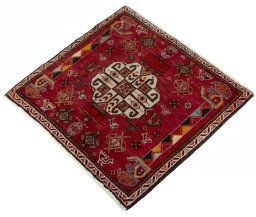 Corner detail of 2000s Shiraz rug showing border pattern and Wool pile