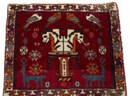 Surface texture of 2000s Shiraz rug with natural Wool and intricate pattern