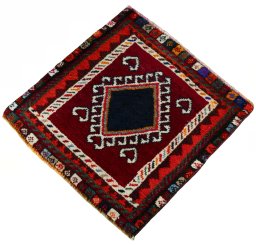 Corner detail of 2000s Shiraz rug showing border pattern and Wool pile