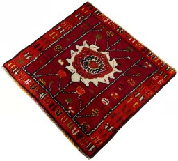 Corner detail of 2000s Shiraz rug showing border pattern and Wool pile
