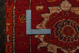 Backside of handmade 2000s Shiraz rug showing knot structure and weave density