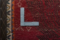 Backside of handmade 2000s Shiraz rug showing knot structure and weave density