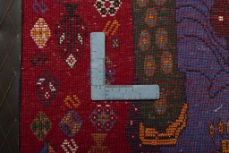 Backside of handmade 2000s Shiraz rug showing knot structure and weave density
