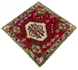 Corner detail of 2000s Shiraz rug showing border pattern and Wool pile