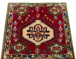 Surface texture of 2000s Shiraz rug with natural Wool and intricate pattern