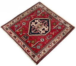 Corner detail of 2000s Shiraz rug showing border pattern and Wool pile