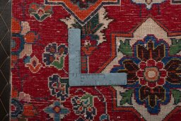 Backside of handmade 2000s Shiraz rug showing knot structure and weave density