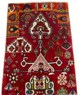 Surface texture of 2000s Shiraz rug with natural Wool and intricate pattern