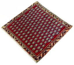 Corner detail of 2000s Shiraz rug showing border pattern and Wool pile