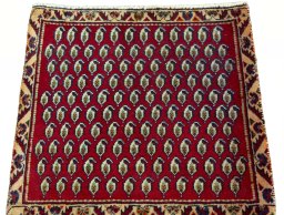 Surface texture of 2000s Shiraz rug with natural Wool and intricate pattern