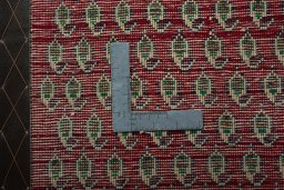 Backside of handmade 2000s Shiraz rug showing knot structure and weave density