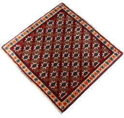 Corner detail of 2000s Shiraz rug showing border pattern and Wool pile
