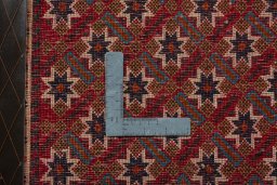 Backside of handmade 2000s Shiraz rug showing knot structure and weave density