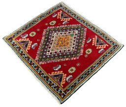 Corner detail of 2000s Shiraz rug showing border pattern and Wool pile