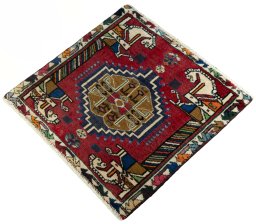 Corner detail of 2000s Shiraz rug showing border pattern and Wool pile