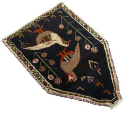 Close-up detail of 2000s Shiraz rug from Iran / Persia showing Wool weave