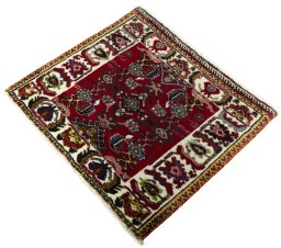 Corner detail of 2000s Shiraz rug showing border pattern and Wool pile