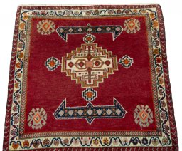 Surface texture of 2000s Shiraz rug with natural Wool and intricate pattern