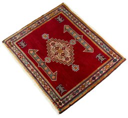 Corner detail of 2000s Shiraz rug showing border pattern and Wool pile