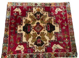 Surface texture of 2000s Shiraz rug with natural Wool and intricate pattern