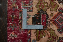 Backside of handmade 2000s Shiraz rug showing knot structure and weave density