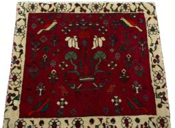 Surface texture of 2000s Shiraz rug with natural Wool and intricate pattern