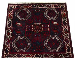 Surface texture of 2000s Shiraz rug with natural Wool and intricate pattern