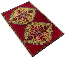 Corner detail of 2000s Shiraz rug showing border pattern and Wool pile