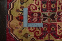 Backside of handmade 2000s Shiraz rug showing knot structure and weave density