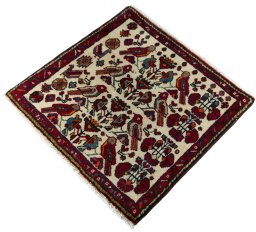 Corner detail of 2000s Shiraz rug showing border pattern and Wool pile