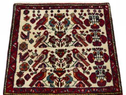Surface texture of 2000s Shiraz rug with natural Wool and intricate pattern