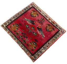 Corner detail of 2000s Shiraz rug showing border pattern and Wool pile
