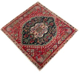 Corner detail of 2000s Shiraz rug showing border pattern and Wool pile