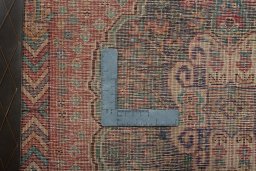 Backside of handmade 2000s Shiraz rug showing knot structure and weave density