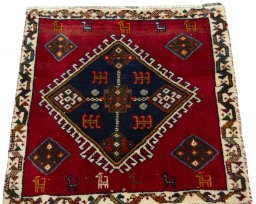 Surface texture of 2000s Shiraz rug with natural Wool and intricate pattern