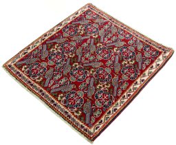 Corner detail of 2000s Shiraz rug showing border pattern and Wool pile