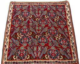 Surface texture of 2000s Shiraz rug with natural Wool and intricate pattern