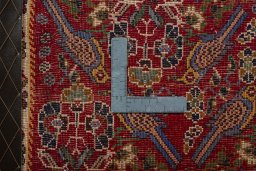 Backside of handmade 2000s Shiraz rug showing knot structure and weave density