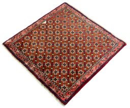 Corner detail of 2000s Shiraz rug showing border pattern and Wool pile