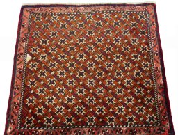 Surface texture of 2000s Shiraz rug with natural Wool and intricate pattern