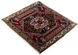 Corner detail of 2000s Shiraz rug showing border pattern and Wool pile