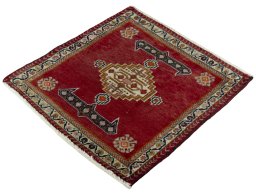 Corner detail of 2000s Shiraz rug showing border pattern and Wool pile