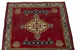 Surface texture of 2000s Shiraz rug with natural Wool and intricate pattern