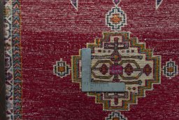 Backside of handmade 2000s Shiraz rug showing knot structure and weave density