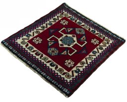 Corner detail of 2000s Shiraz rug showing border pattern and Wool pile