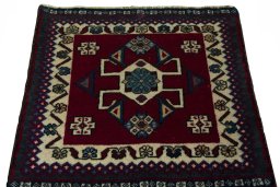 Surface texture of 2000s Shiraz rug with natural Wool and intricate pattern