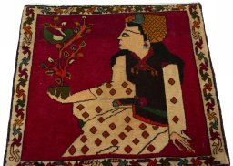 Surface texture of 2000s Shiraz rug with natural Wool and intricate pattern