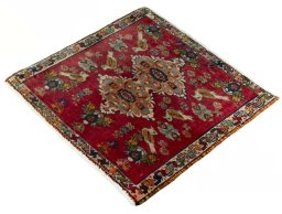 Corner detail of 2000s Shiraz rug showing border pattern and Wool pile